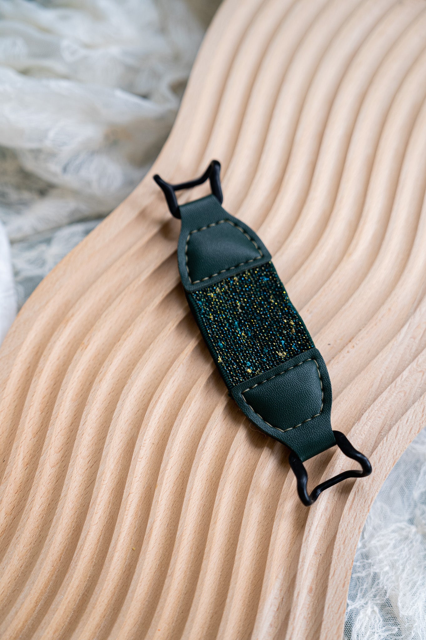 Ergonomic e-reader hand strap by Kittentailor providing comfort and style. Aesthetic accessory to boost reading mood and bring joy.